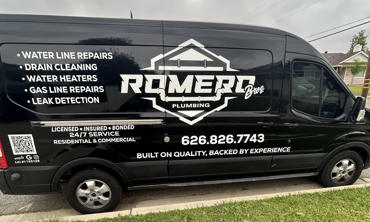 Romero Bros Plumbing service van with company branding